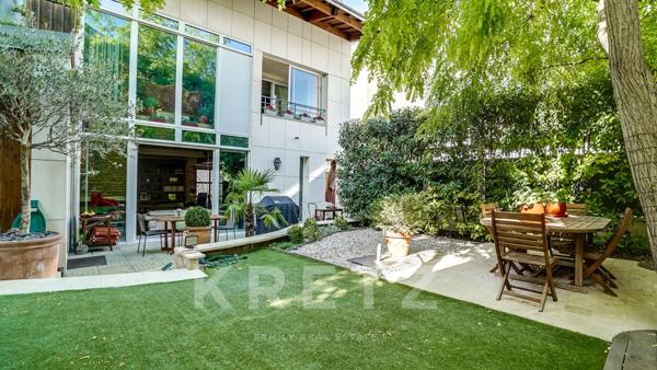 Maison d'architecte sur jardin arboré