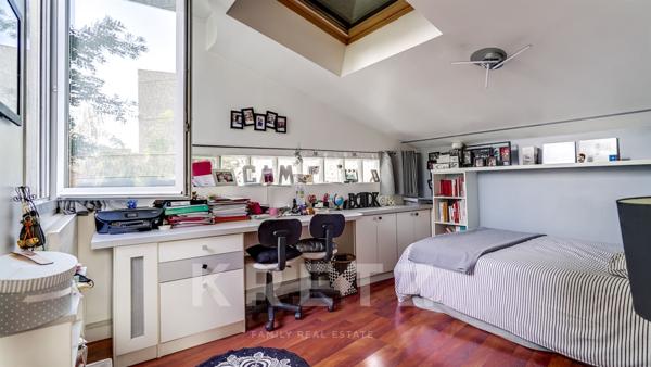 Maison d'architecte sur jardin arboré