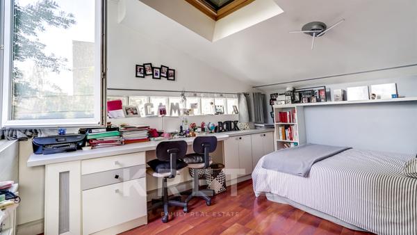 Maison d'architecte sur jardin arboré