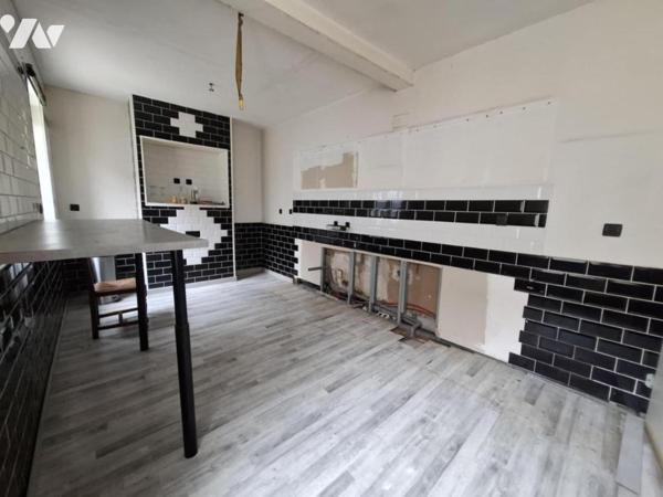 Maison mitoyenne, 2 chambres, garage et cour