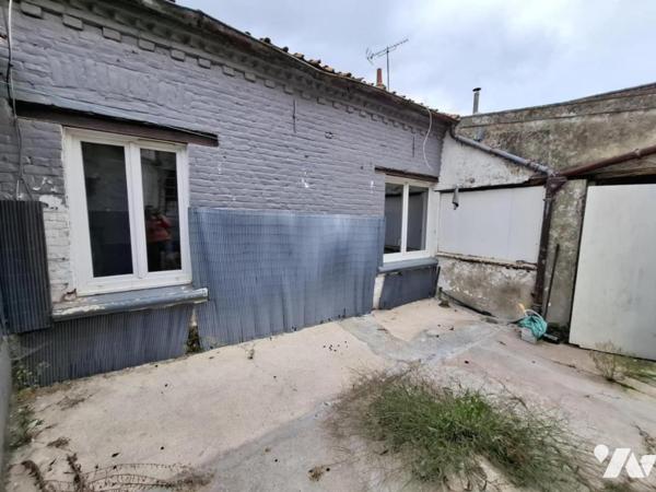 Maison mitoyenne, 2 chambres, garage et cour