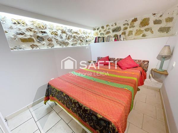 REZ DE JARDIN DE 78M2 AVEC DEPENDANCE