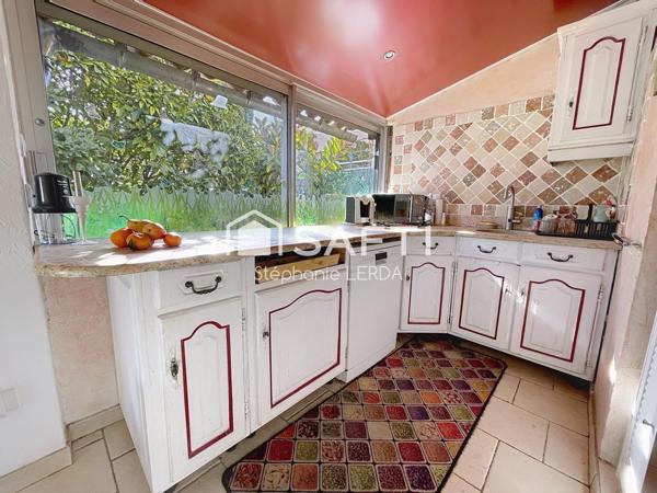 REZ DE JARDIN DE 78M2 AVEC DEPENDANCE