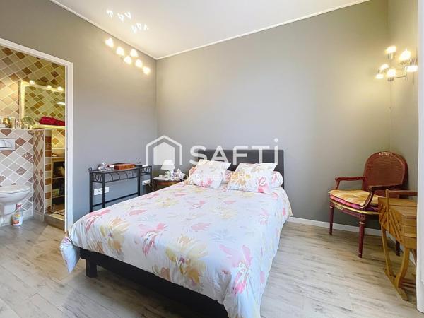 REZ DE JARDIN DE 78M2 AVEC DEPENDANCE