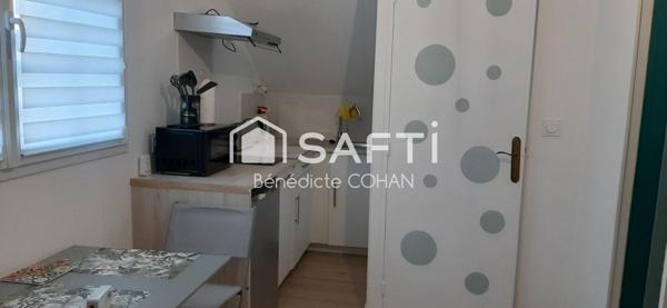 Pavillon divisé en quatre logements