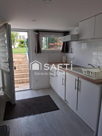 Pavillon divisé en quatre logements