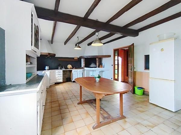 Maison de 7 pièces avec bâtiments commerciaux