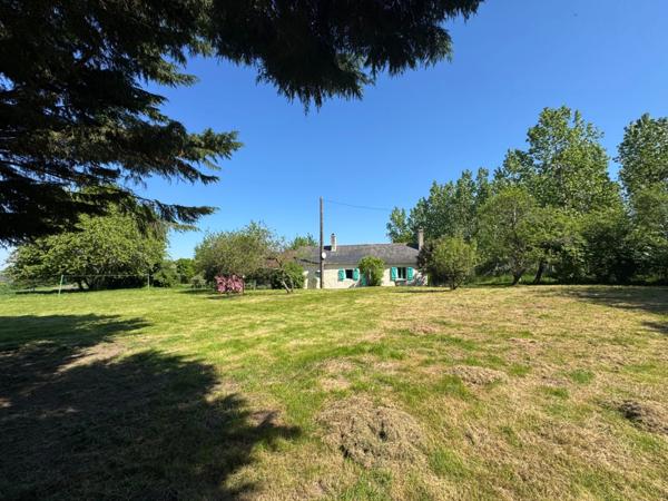 Charmante maison de campagne avec terrain arborée et fruitier de 3 500 m² – proche du Lude