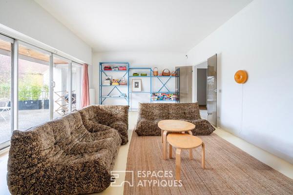 Maison d’architecte sur pilotis face à la Marne