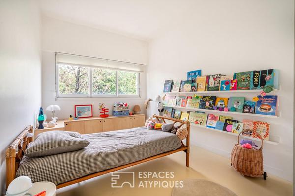 Maison d’architecte sur pilotis face à la Marne