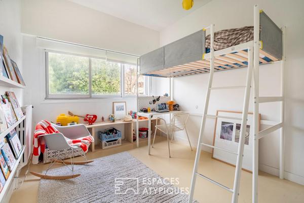 Maison d’architecte sur pilotis face à la Marne