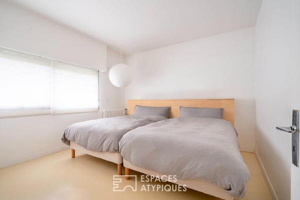 Maison d’architecte sur pilotis face à la Marne