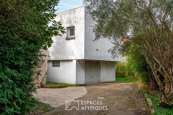Maison d’architecte sur pilotis face à la Marne