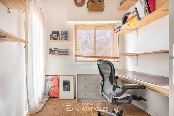 Maison d’architecte sur pilotis face à la Marne