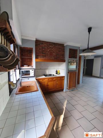 Maison 95 m² - vivable de plain-pied - sous-sol complet - jardin.