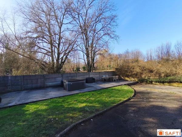 Maison 95 m² - vivable de plain-pied - sous-sol complet - jardin.