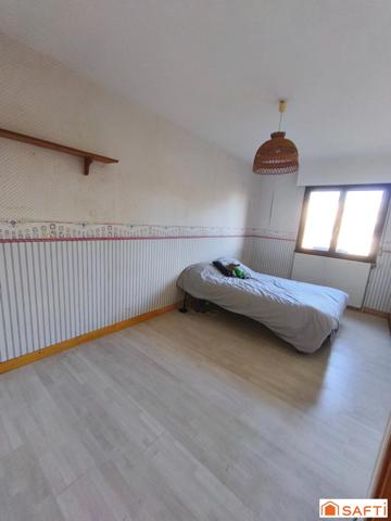 Maison 95 m² - vivable de plain-pied - sous-sol complet - jardin.