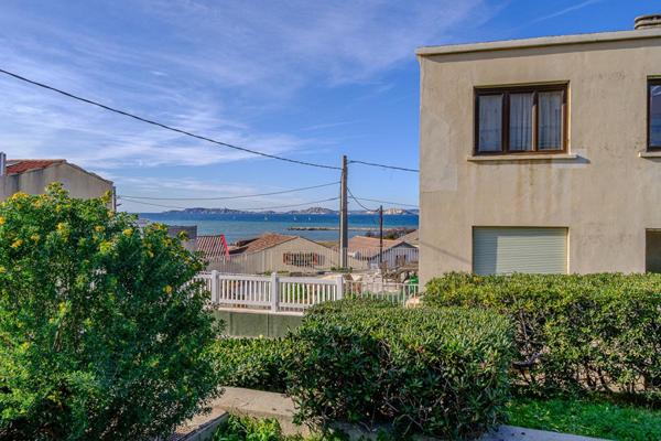 Appartement  4 pièce(s) 118 m2 vue mer, jardin partagé, box de garage