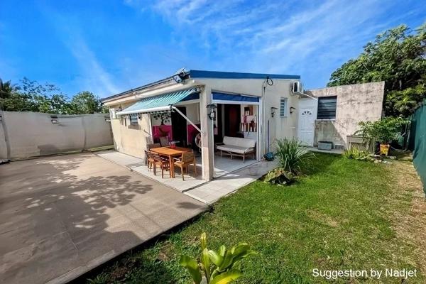 À vendre – Maison avec terrasse sur terrain de 972m²