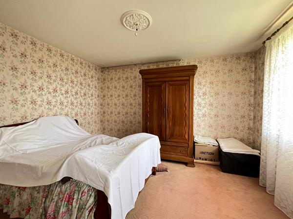 A vendre quartier Saint Georges - Maison avec garage et jardin.