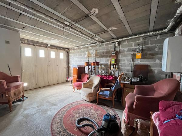 A vendre quartier Saint Georges - Maison avec garage et jardin.