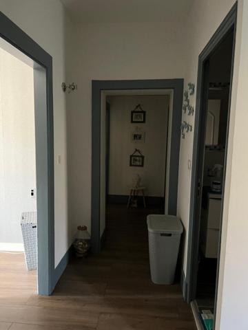 Maison de 122 m2, 3 chambres, bureau, garage et jardin.