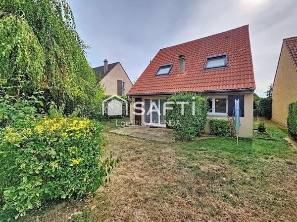 Maison individuelle avec jardin clôturé et garage