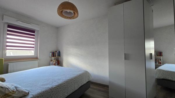 Appartement 3 pièces, 72m², balcon, ascenseur, place de parking privative et garage.