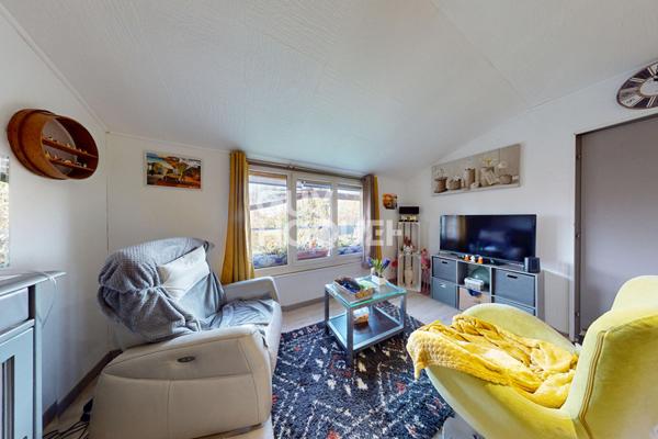 Ensemble immobilier avec appartement T2 + garage, local commercial et jardin à SAMADET