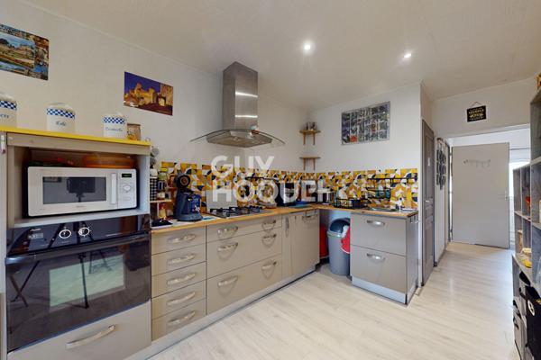 Ensemble immobilier avec appartement T2 + garage, local commercial et jardin à SAMADET