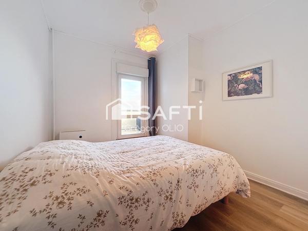 APPARTEMENT 2 PIECES AVEC TERRASSE ET PLACE DE PARKING