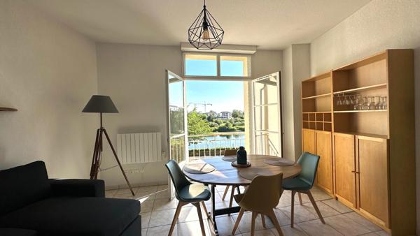 Dpt Dordogne (24), à louer BERGERAC Appartement T3 56 m2, 2 chambres, résidence sécurisée, place de parking privée avec vue sur la Dordogne