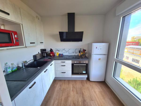 Appartement T2 balcon + place parking sécurisée