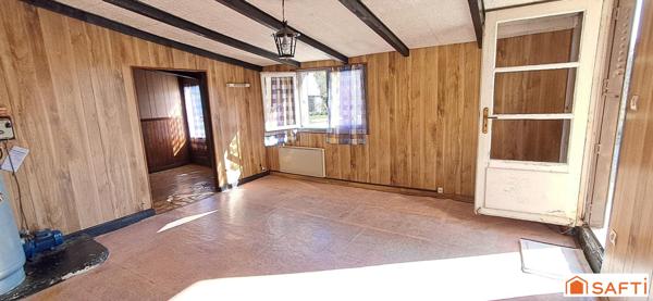 Maison à rénover de 98m² au sol garage et terrain