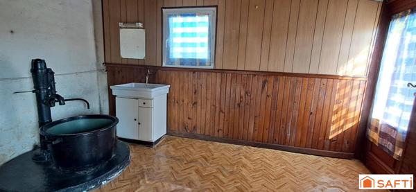 Maison à rénover de 98m² au sol garage et terrain