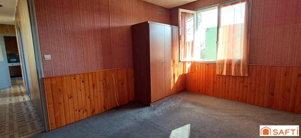 Maison à rénover de 98m² au sol garage et terrain