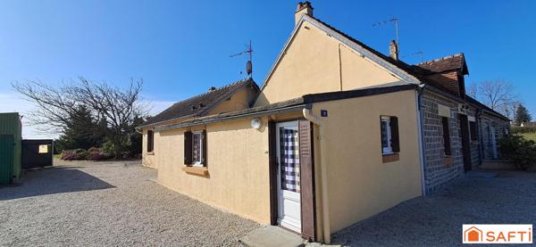 Maison à rénover de 98m² au sol garage et terrain