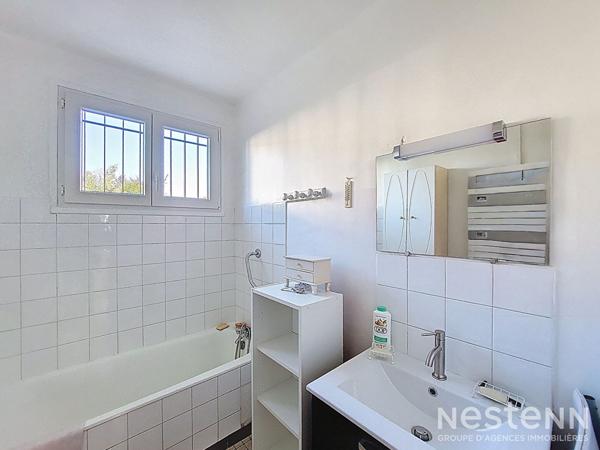 A Vendre Maison rénovée de plain-pied de 88 m² avec garage et jardin dans quartier résidentiel de Condom