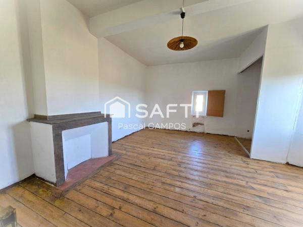 Maison de ville avec terrasse et petit jardin