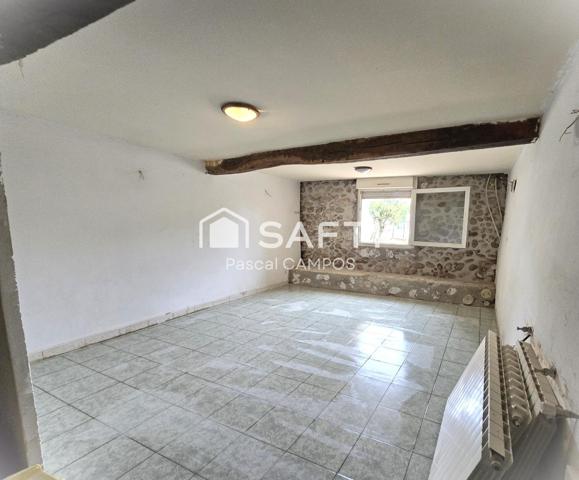 Maison de ville avec terrasse et petit jardin