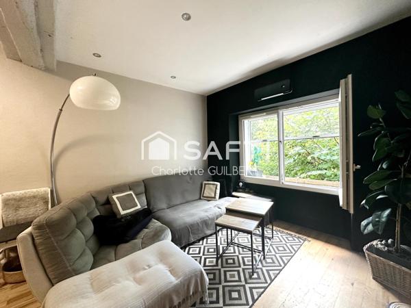 Maison de ville avec terrasse et local commercial