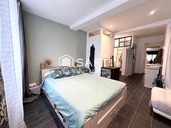 Maison de ville avec terrasse et local commercial