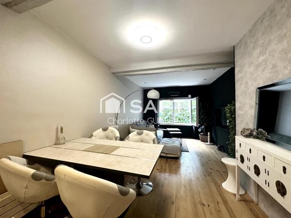 Maison de ville avec terrasse et local commercial