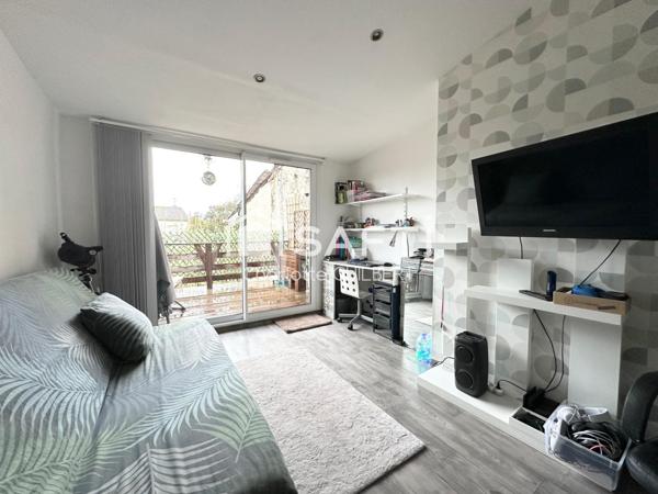 Maison de ville avec terrasse et local commercial