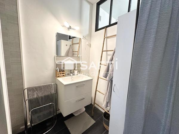 Maison de ville avec terrasse et local commercial