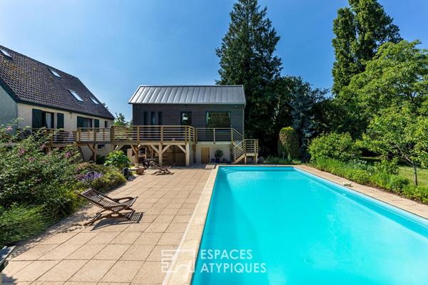 Maison sur île privée avec dépendance d’architecte, piscine et ponton privatif