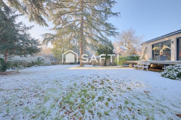 Maison d'exception avec magnifique jardin arboré au sein du quartier du Parc