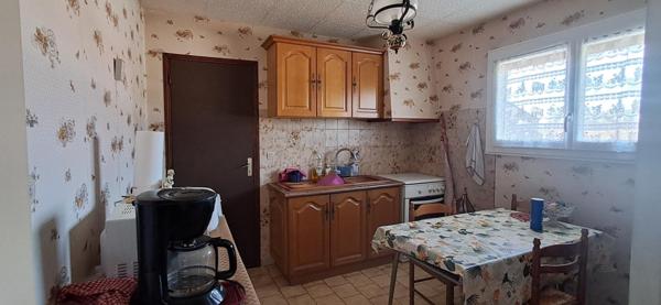 Maison plain pied avec garage, jardin, 2 chambres