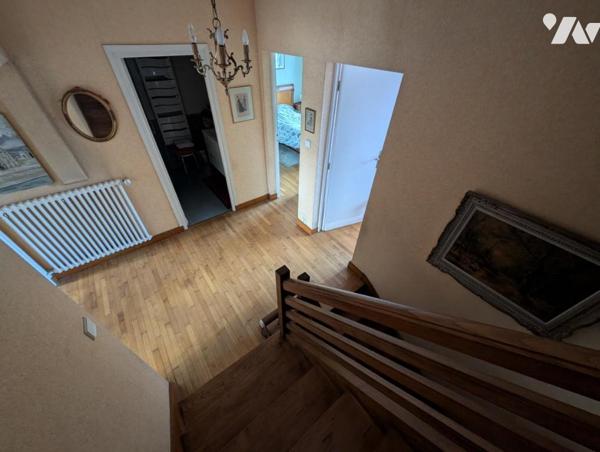 LANNION – Plein centre-ville – Immeuble avec local commercial et habitation sur parcelle constructib