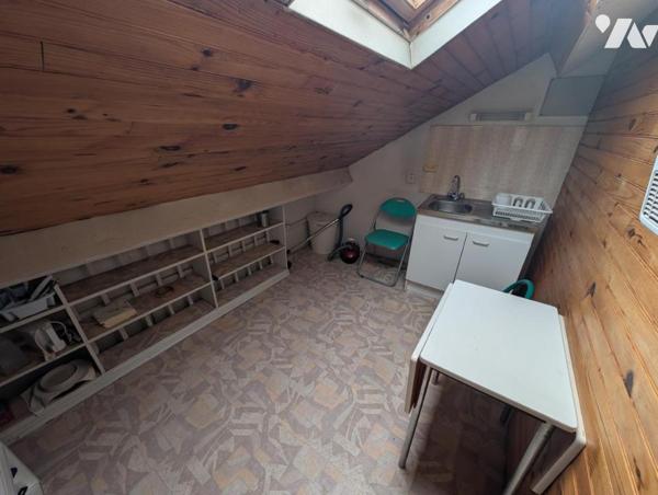 LANNION – Plein centre-ville – Immeuble avec local commercial et habitation sur parcelle constructib